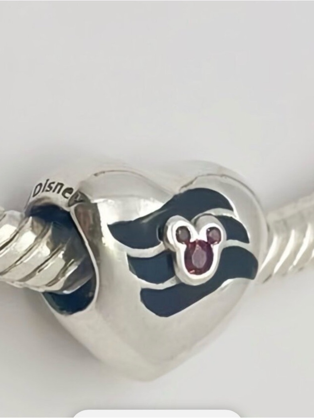 Retired Pandora Disney Cruise Line heart charm made of sterling silver
